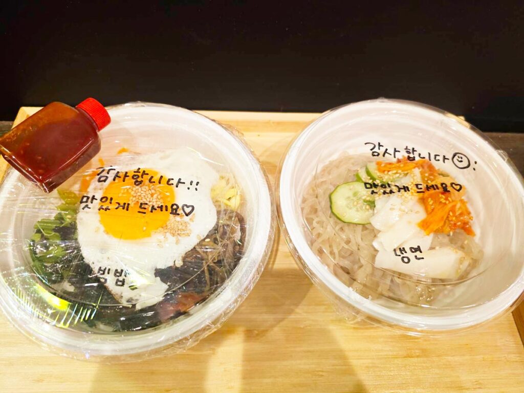 ハングルの手書きメッセージが書かれた韓TARASHIのUber Eats容器
